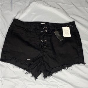 Black hi-rise cheeky denim shorts